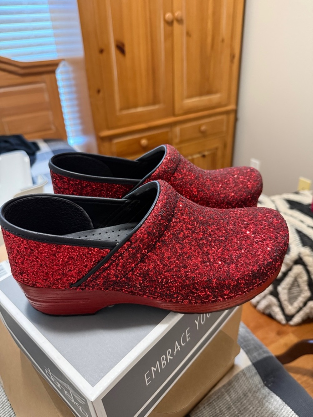 Dansko Red Glitter Clogs with Black Trim